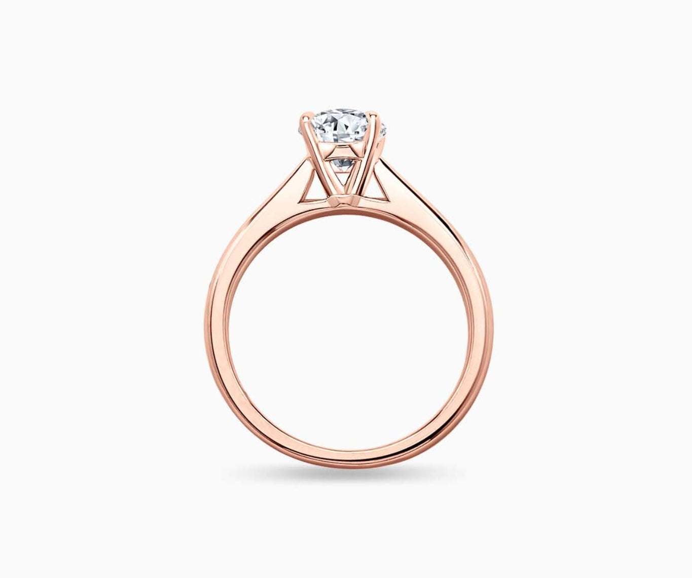 LVC solitaire ring with classic straight plain band with a diamond on the centre made for your everyday sparkle in rose gold from different view