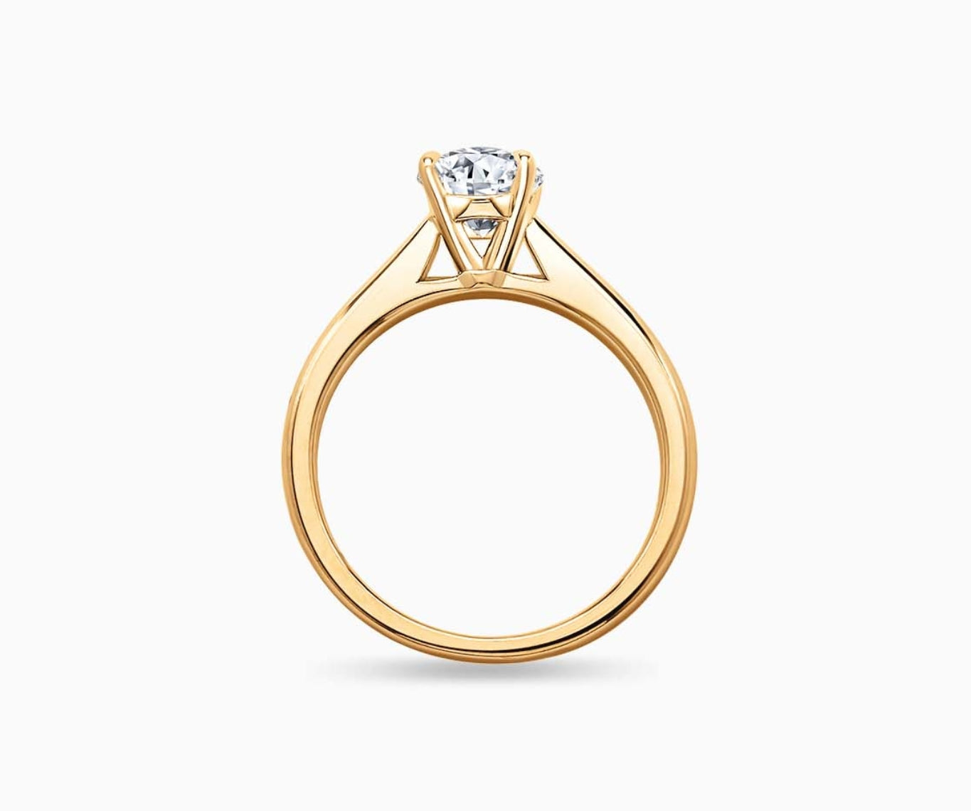 LVC solitaire ring with classic straight band and diamond on the centre in yellow gold from different angle