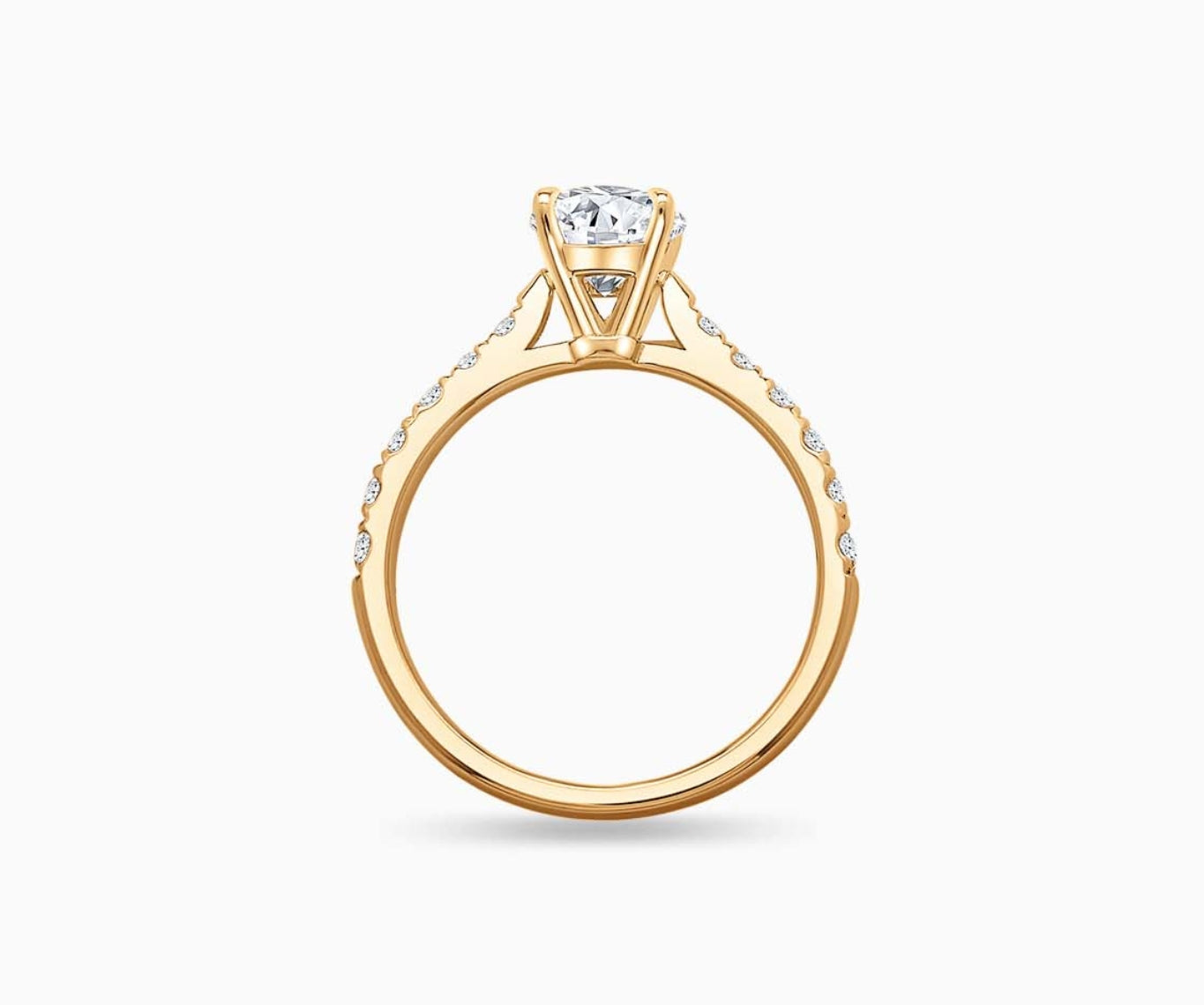 LVC solitaire rings with tapered pave band with centre diamond, and lined with side diamonds in yellow gold from different view
