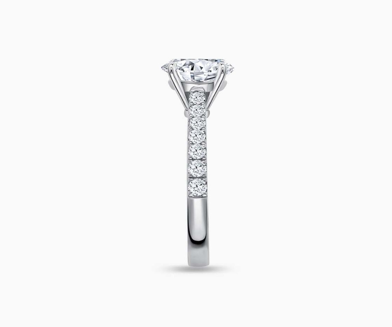 LVC solitaire ring with the classic straight pave band lined with side diamonds for your everyday sparkle seen from side angle