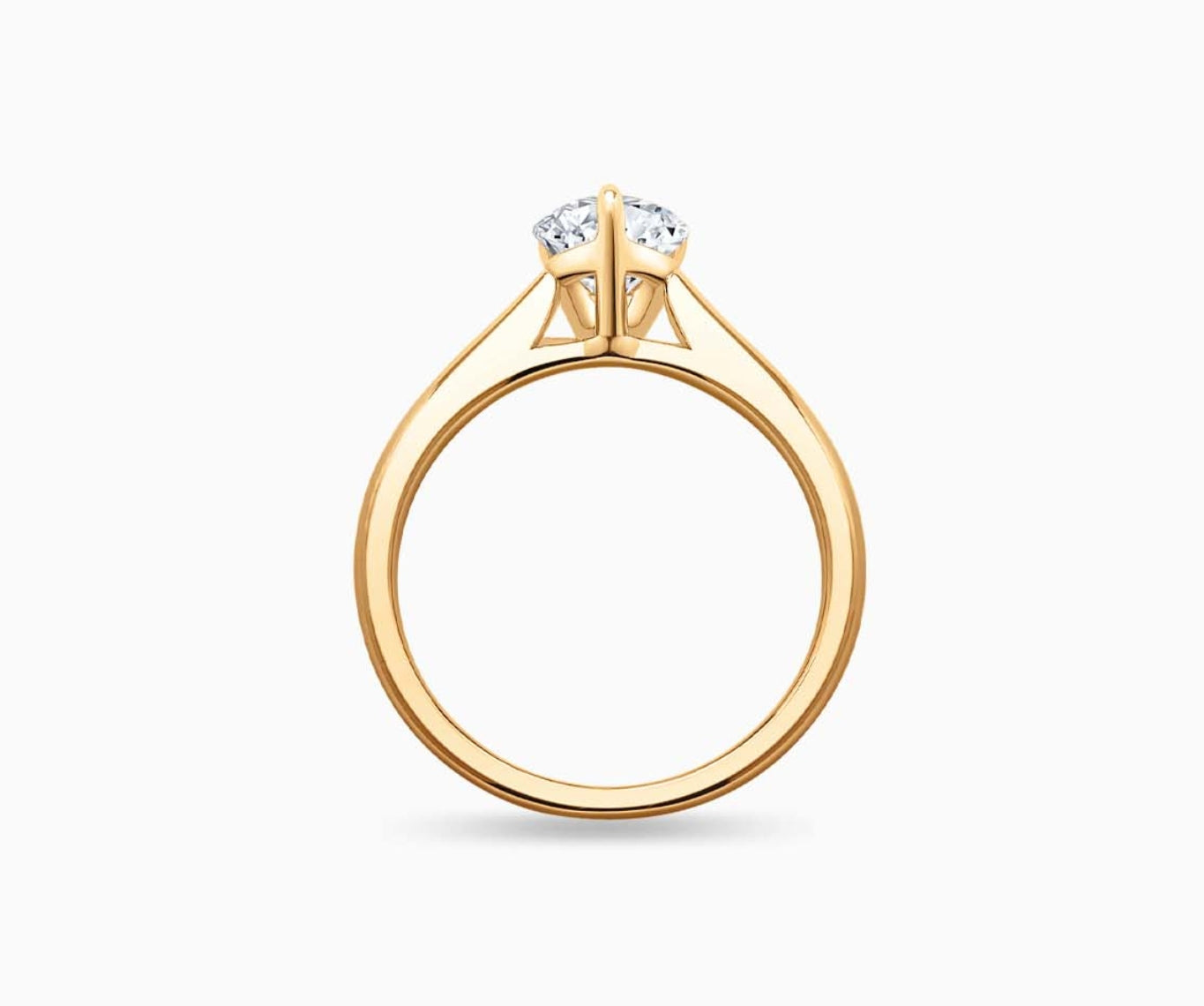 LVC solitaire ring with tapered plain band design which tapers inwards going from thick to thin and diamond on the centre in yellow gold from different angle