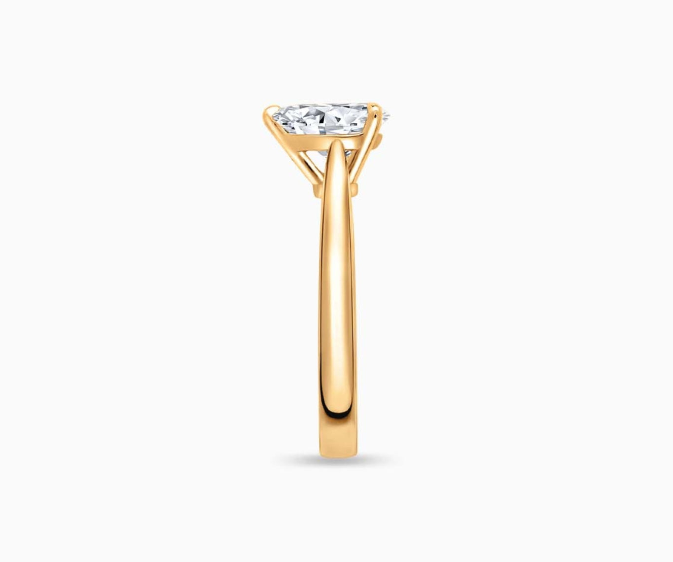 LVC solitaire ring with tapered plain band design which tapers inwards going from thick to thin and diamond on the centre in yellow gold from side angle