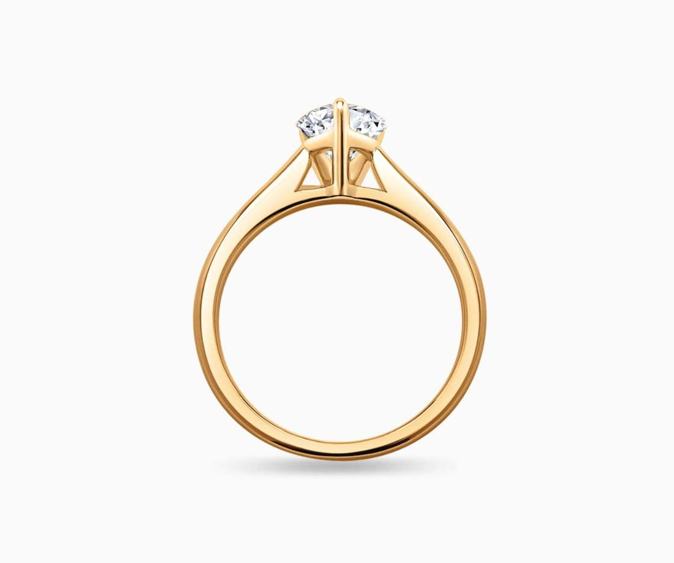 LVC solitaire ring with classic straight band and diamond on the centre in yellow gold from different angle