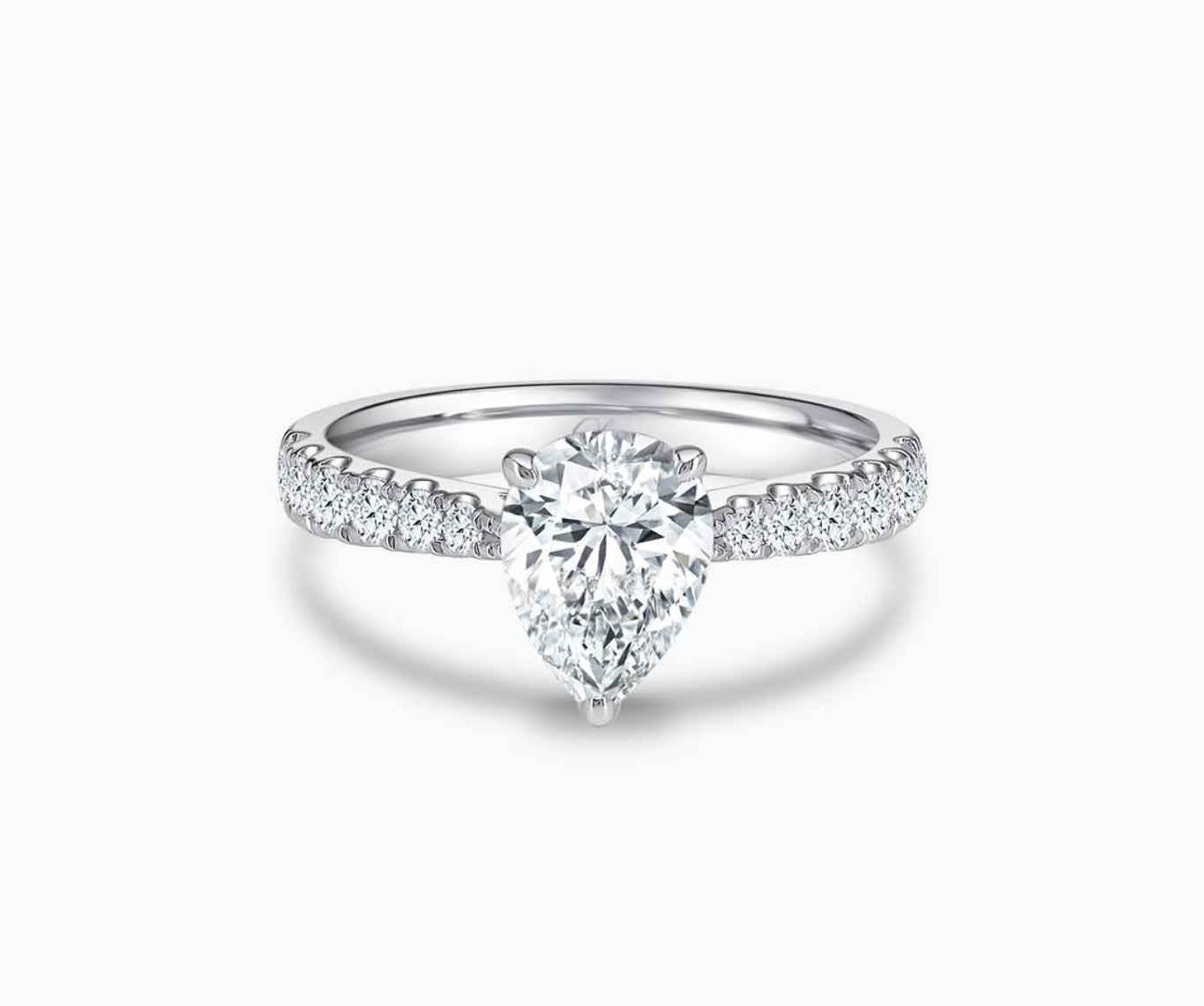 LVC solitaire ring with tapered band style lined with side diamonds, that narrows the width towards the mount, accentuates the beauty of the centre stone