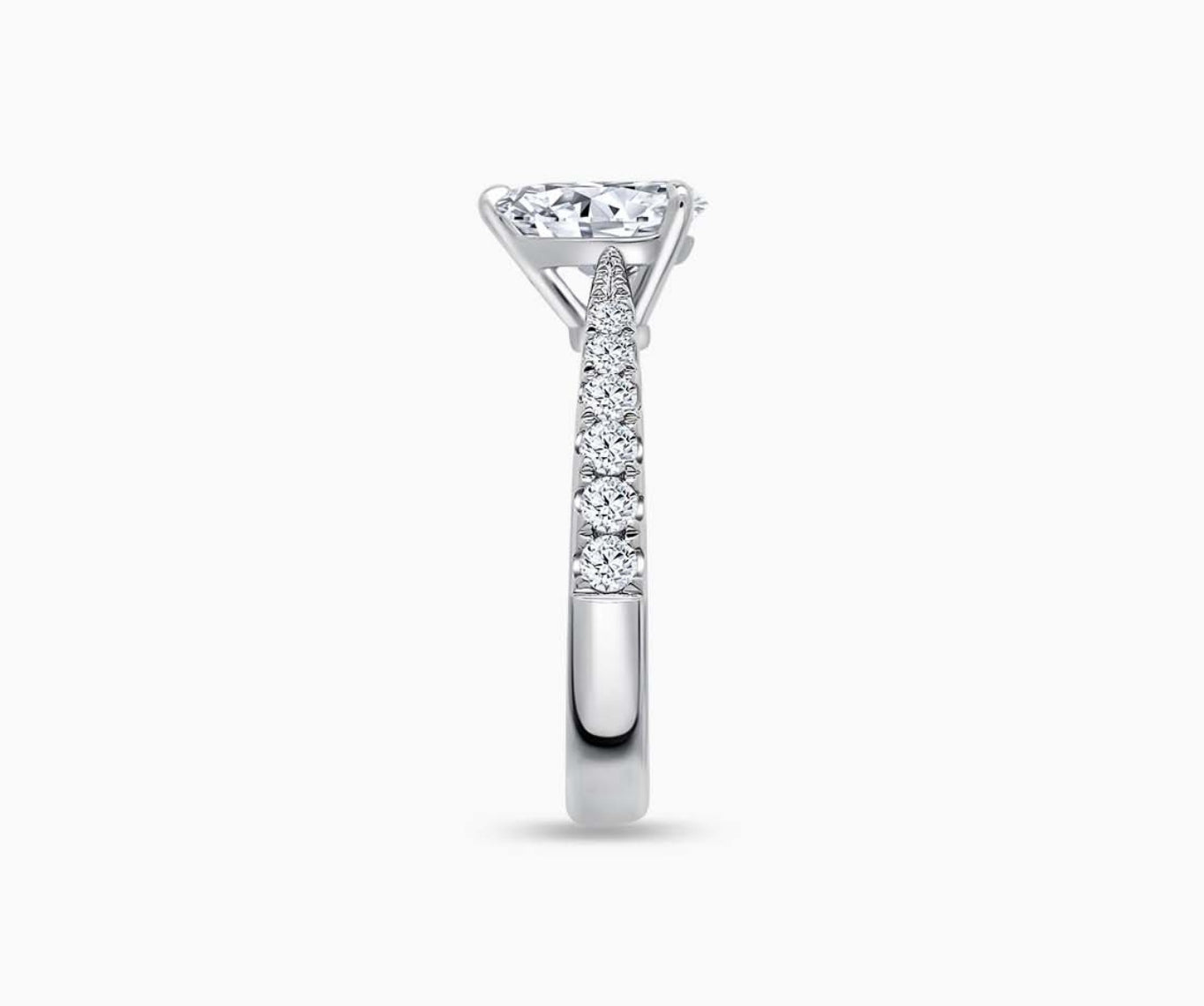 LVC solitaire ring with tapered band style lined with side diamonds, that narrows the width towards the mount, accentuates the beauty of the centre stone seen from side angle