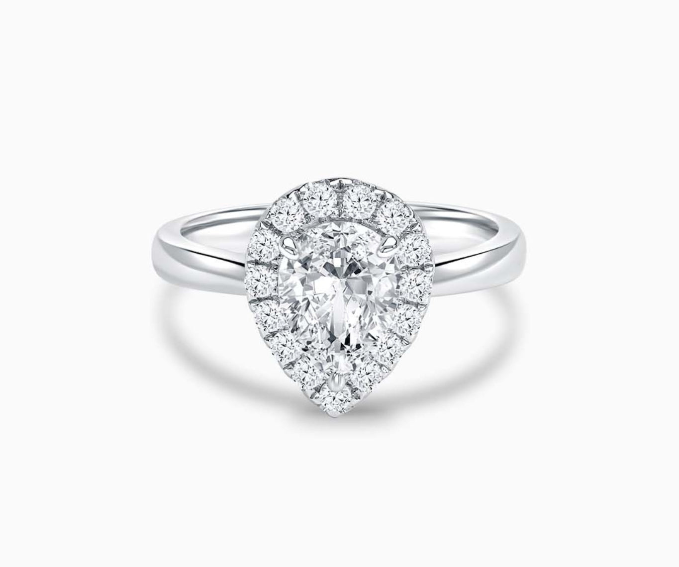 Pear Shaped halo diamond engagement ring with tapered plain band 
