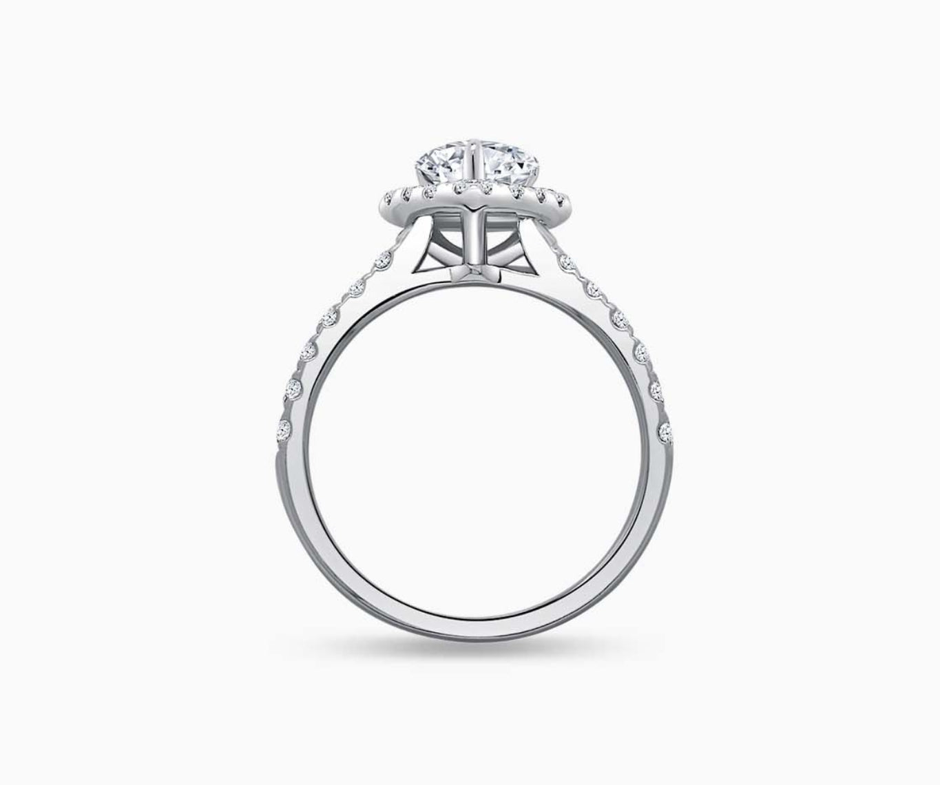 side view of Pear Shaped halo diamond engagement ring with tapered pave band 