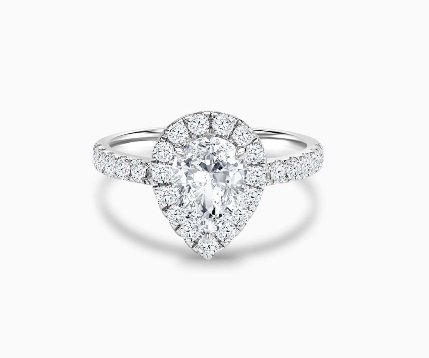 Pear Shaped halo diamond engagement ring with straight pave band