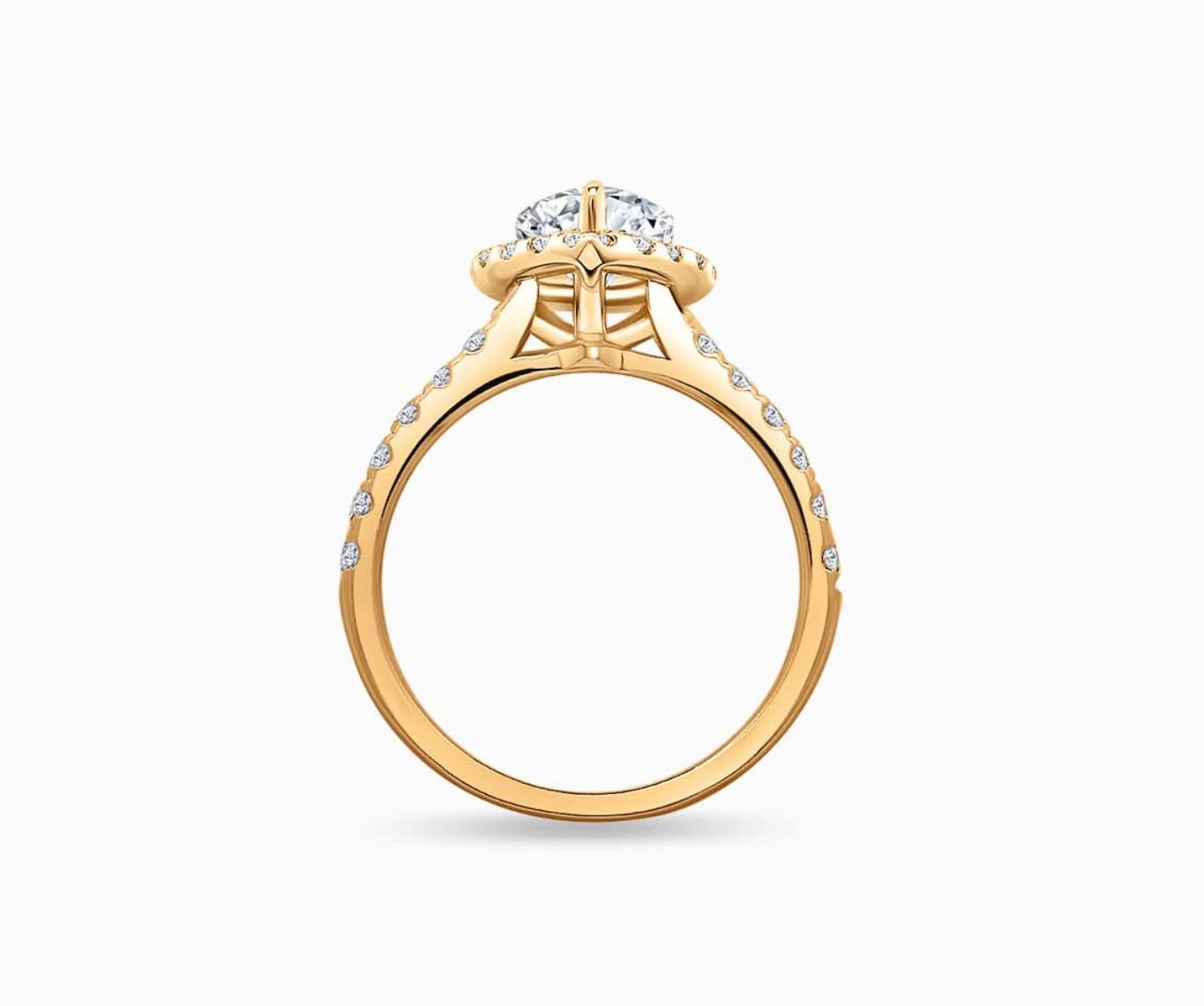 side view of Pear Shaped diamond halo engagement ring set on yellow gold with a straight pave band design