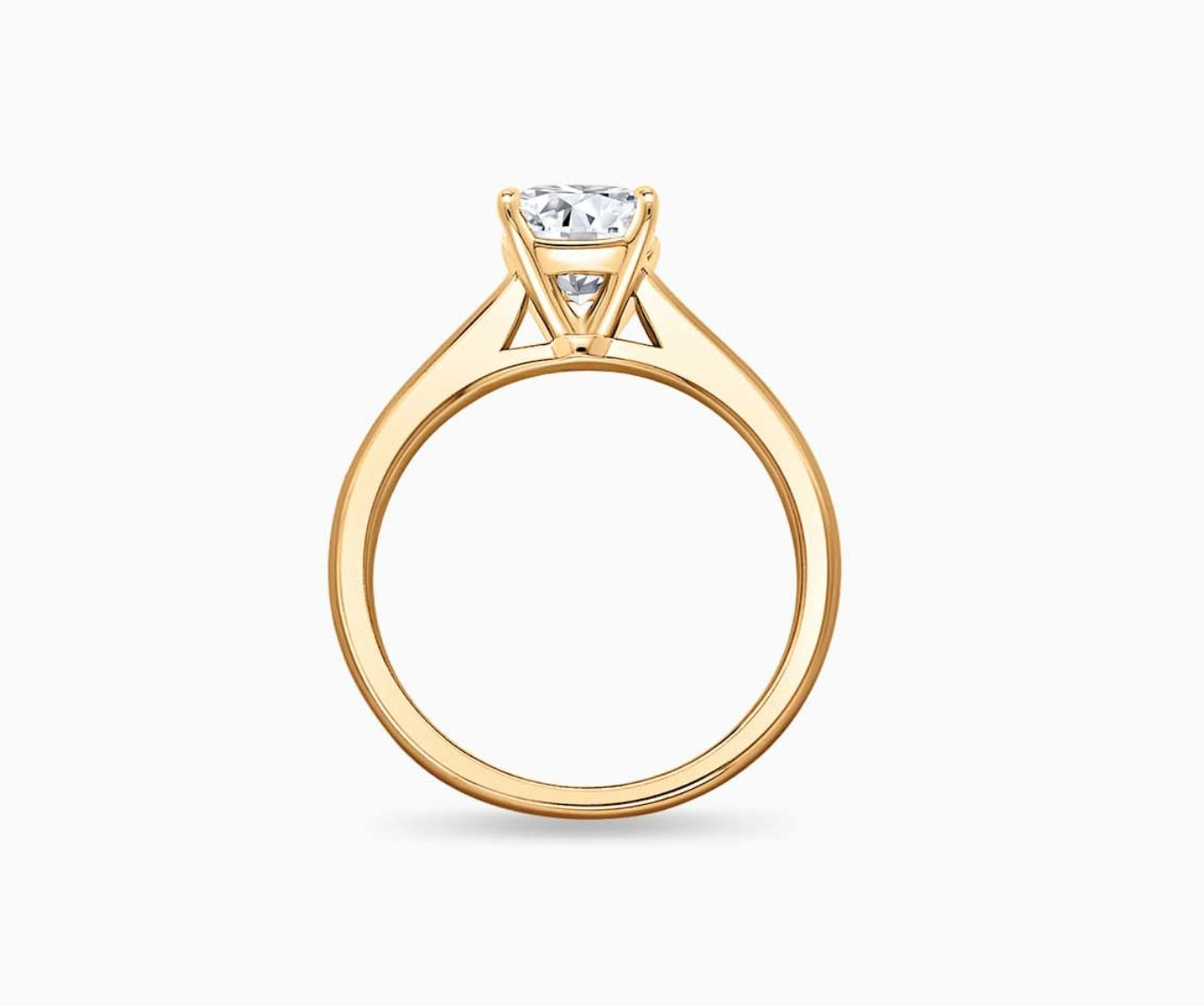 LVC solitaire ring with tapered plain band design which tapers inwards going from thick to thin and diamond on the centre in yellow gold from different angle