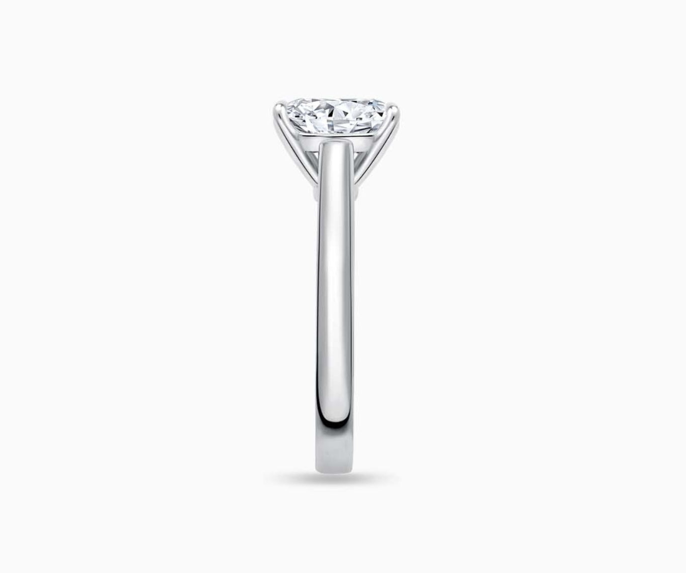 LVC solitaire ring with the classic straight plain band made for your everyday sparkle seen from side angle