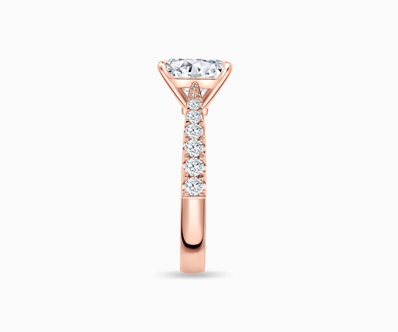 LVC solitaire ring with tapered paved band lined with side diamonds, this versatile band design tapers inwards going from thick to thin from side angle
