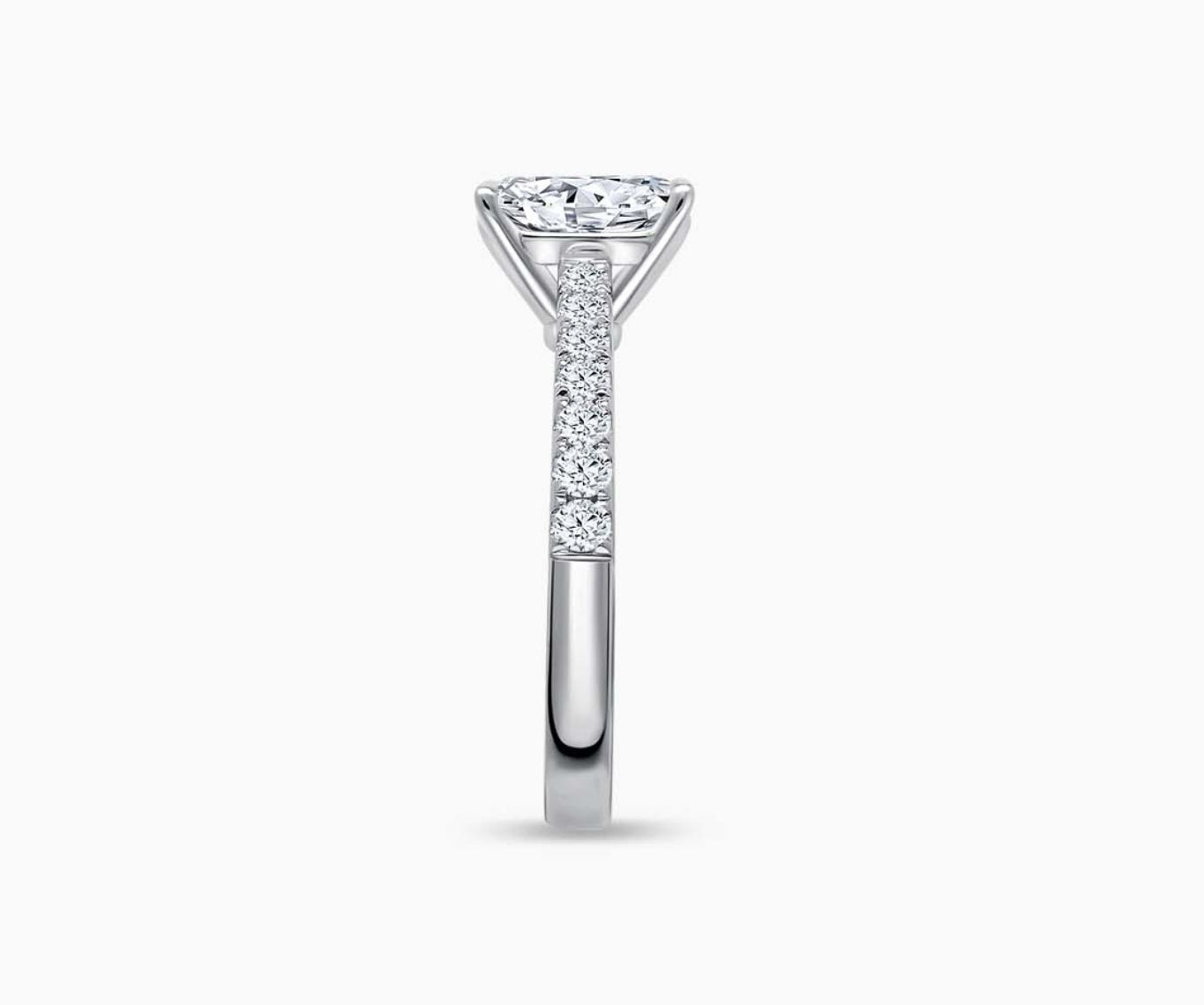 LVC solitaire ring with the classic straight pave band lined with side diamonds for your everyday sparkle seen from side angle