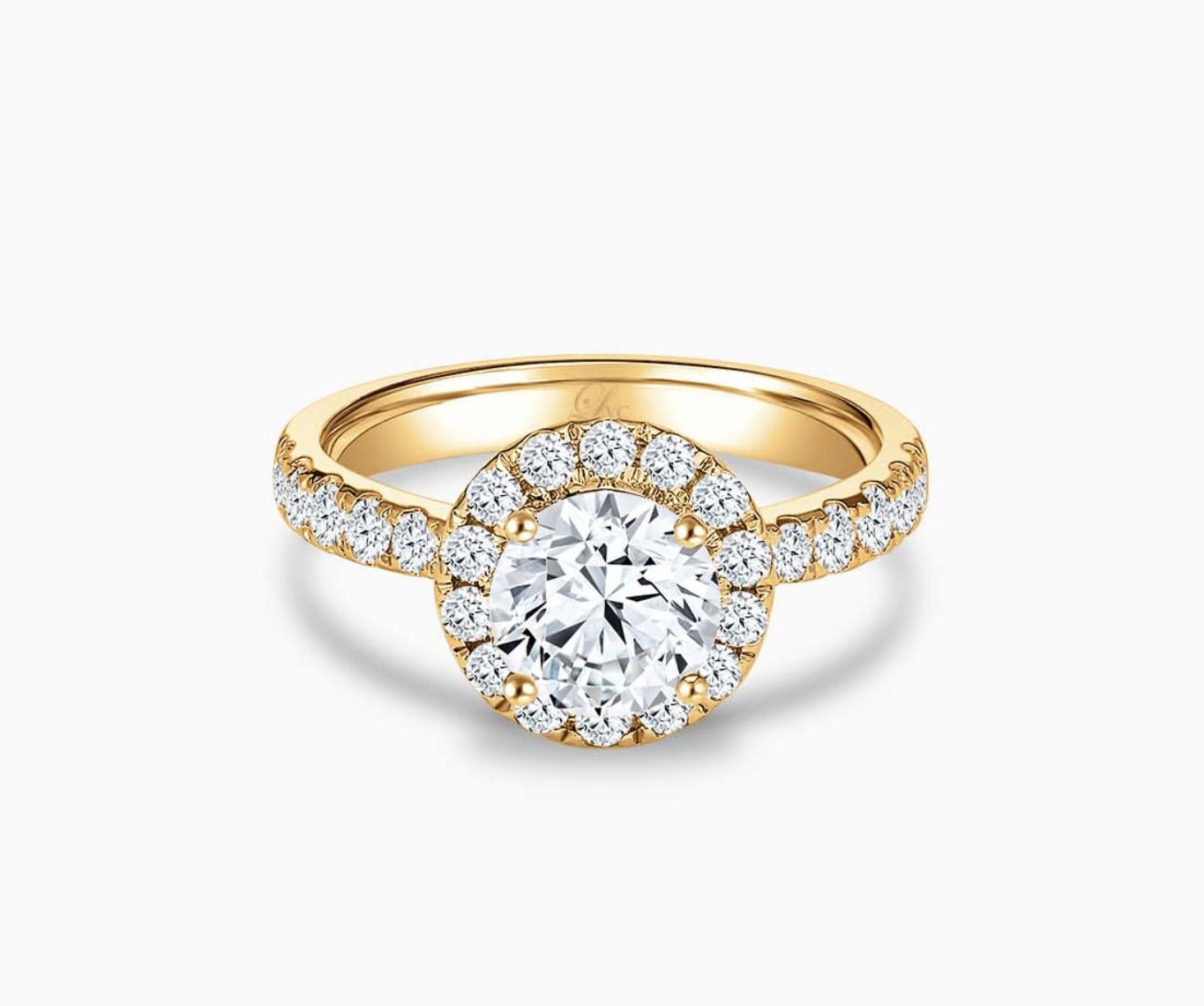 Round cut diamond halo engagement ring set on yellow gold with a tapered pave band design