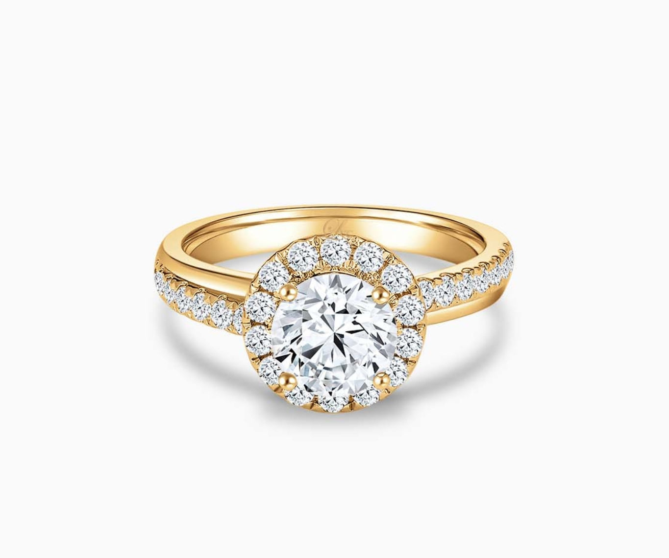 Round cut diamond halo engagement ring set on yellow gold with a double pave band design
