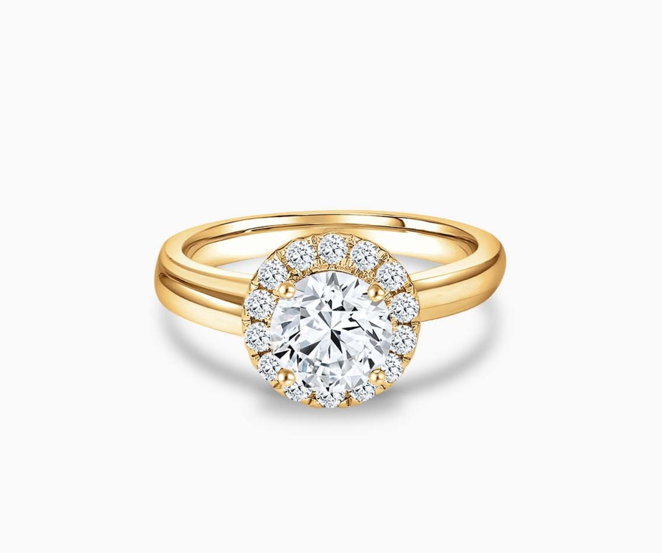 Round cut diamond halo engagement ring set on yellow gold with a double plain band design