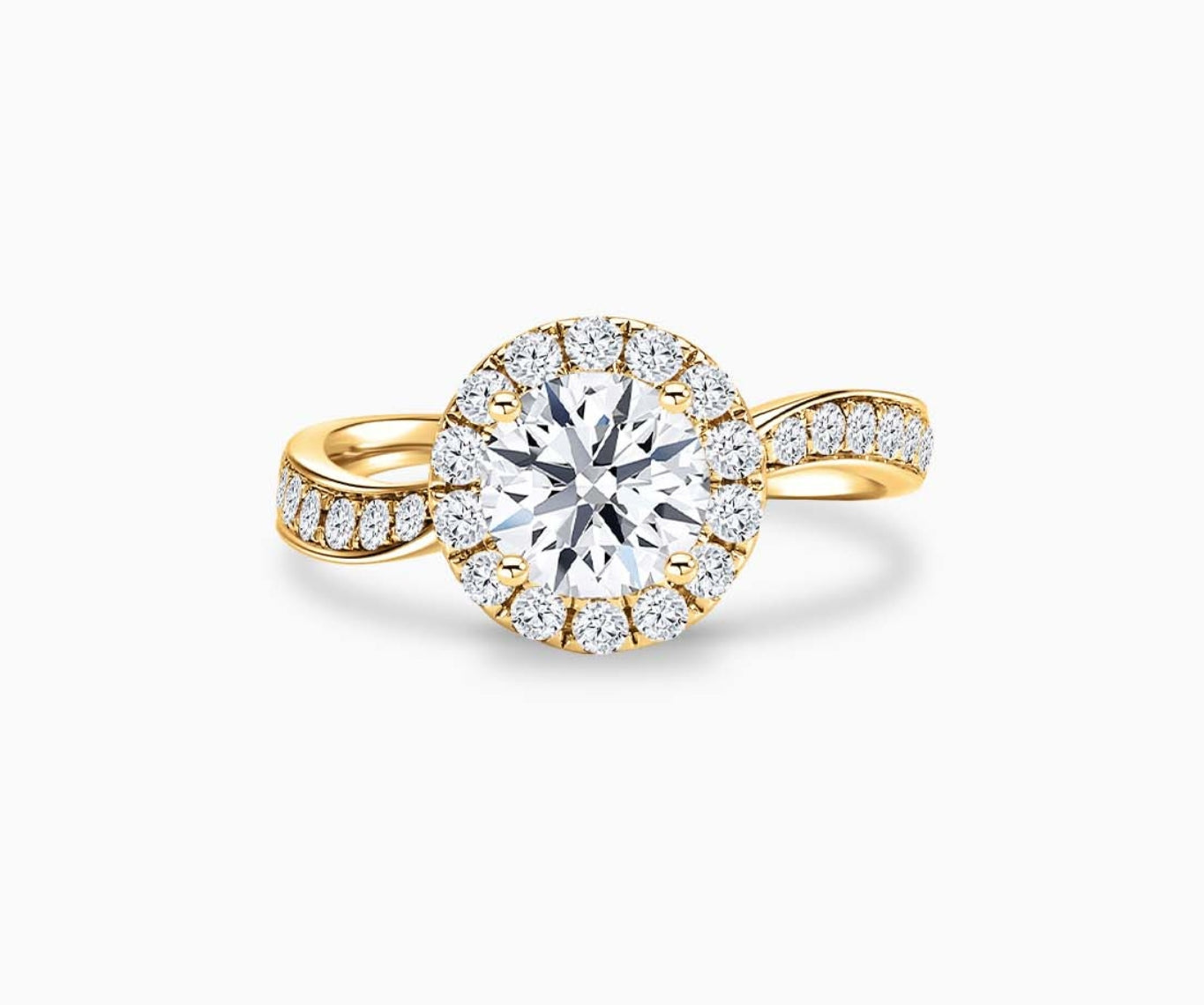 Round cut diamond halo engagement ring set on yellow gold with a twirl pave band design