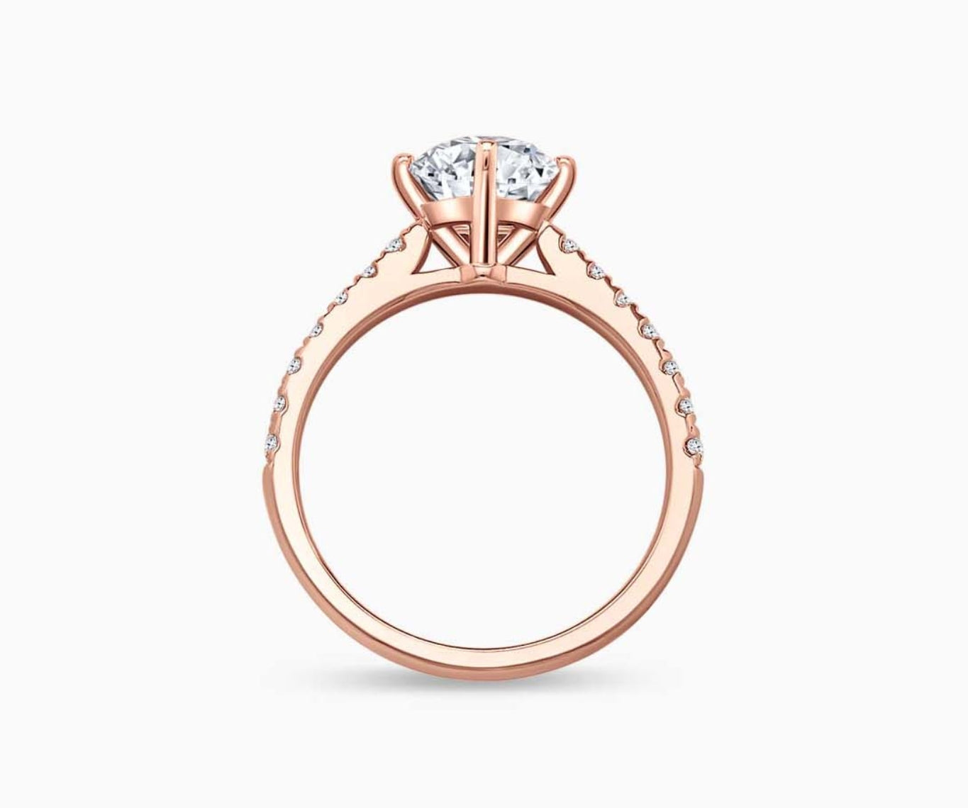 Timeless rose gold solitaire diamond ring with a classic straight pave band lined with side diamonds, designed for lifelong elegance and everyday sparkle