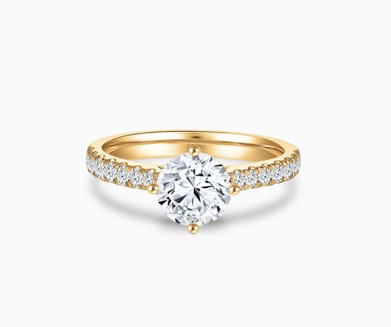 Timeless yellow gold solitaire diamond ring with a classic straight pave band lined with side diamonds, designed for everyday elegance and lifelong wear.