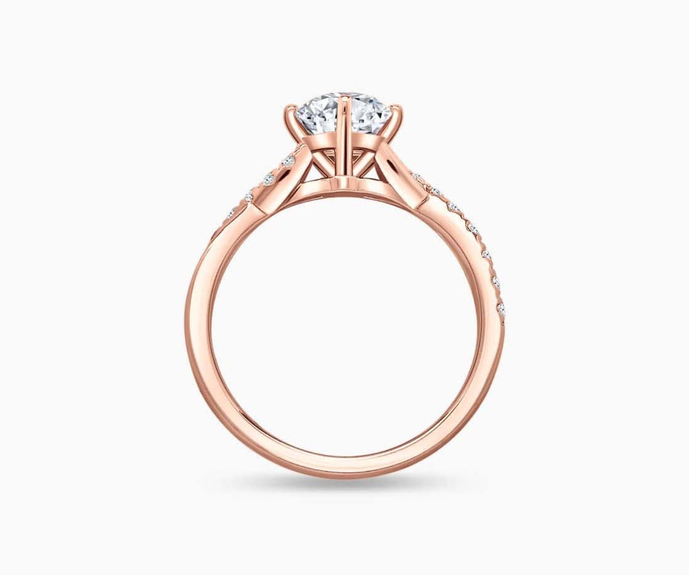 Rose gold solitaire diamond ring with a twisted infinity band lined with side diamonds, symbolizing two entwining lives in a romantic and unique design.