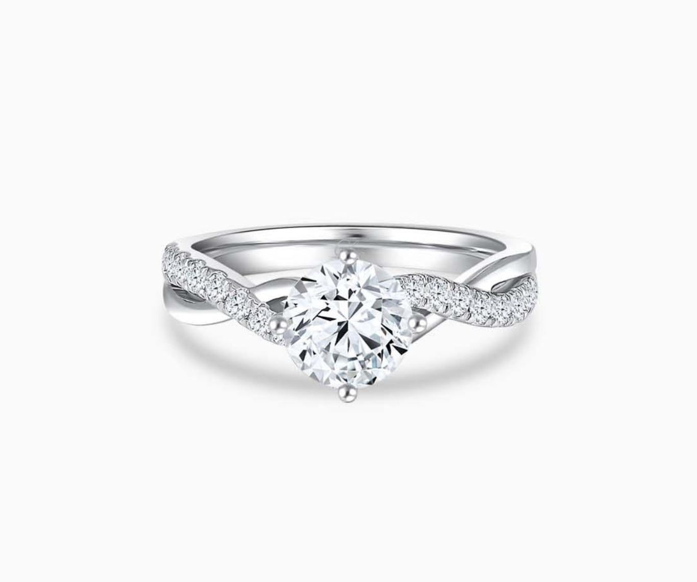 Solitaire diamond ring with a twisted infinity white gold band lined with side diamonds, symbolizing two entwining lives in a romantic and unique design
