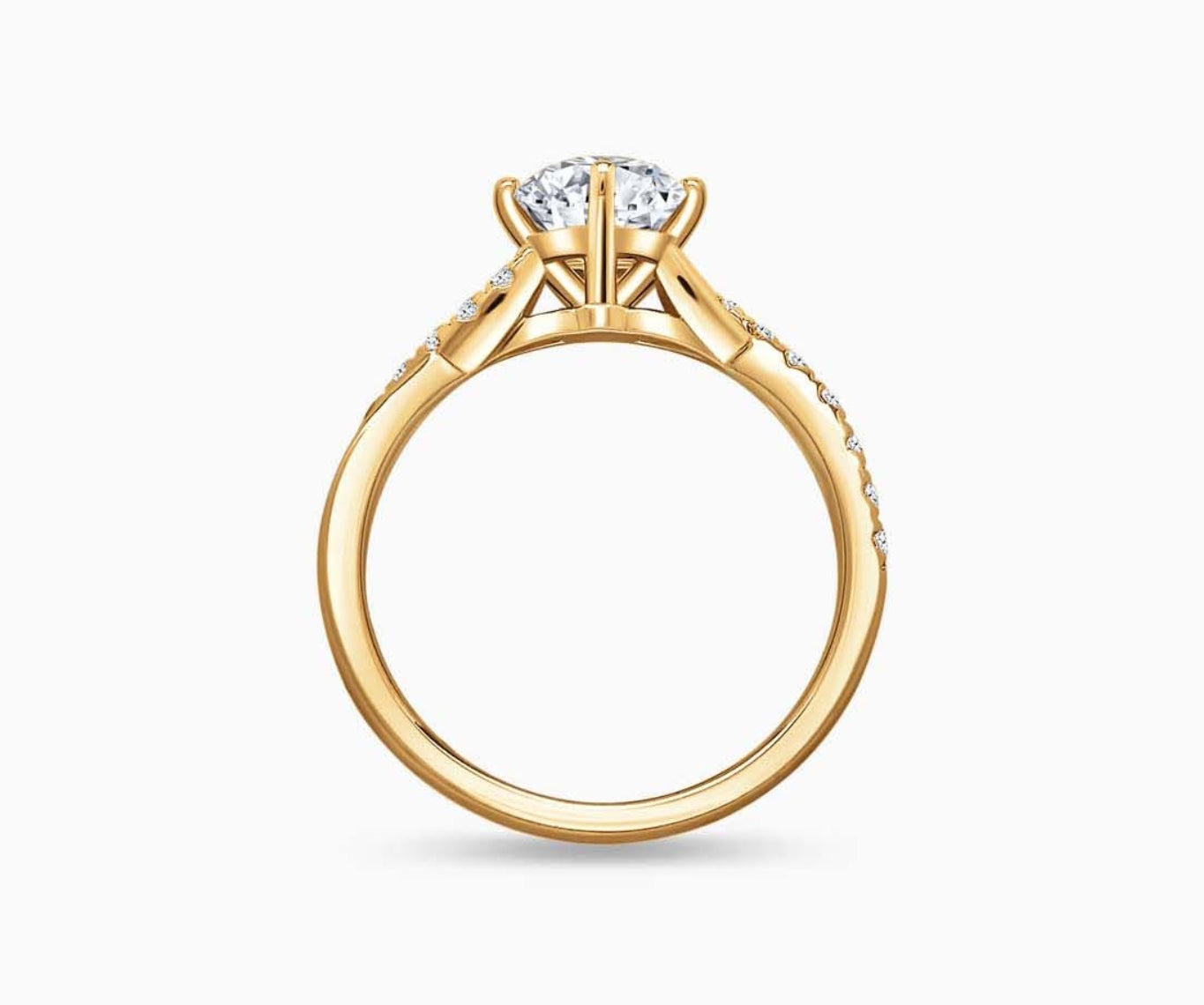 Yellow gold solitaire diamond ring with a twisted infinity pave band lined with side diamonds, symbolizing two entwining lives in a romantic and unique design