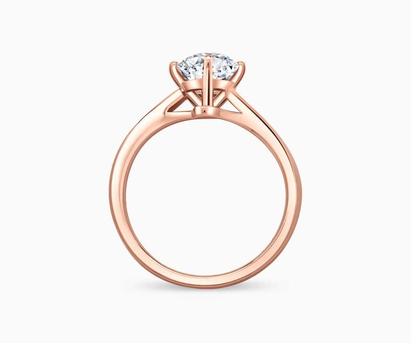Modern rose gold solitaire diamond ring with a double band design, featuring a subtle center line engraving for a sleek and bold look