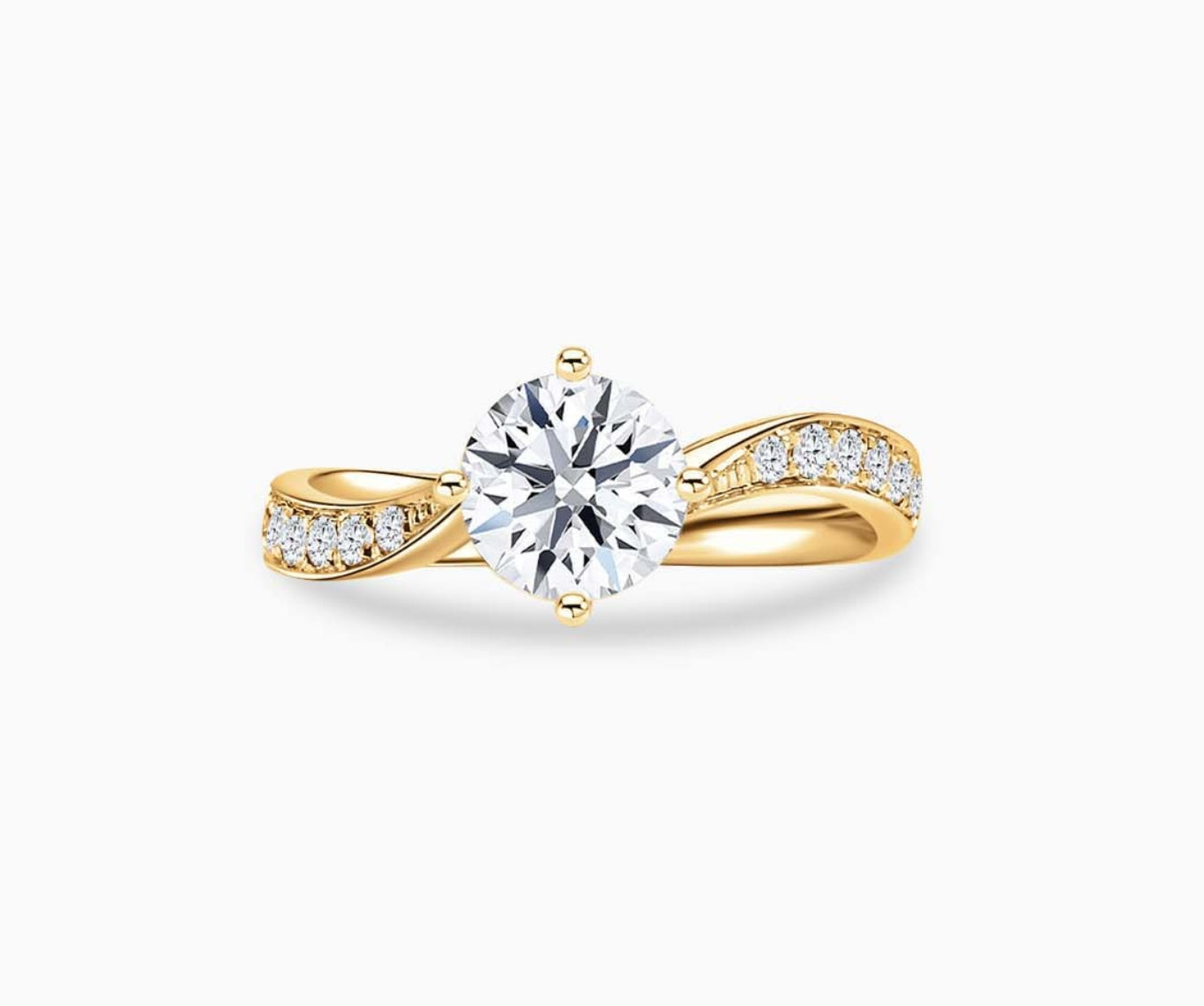 Yellow gold solitaire diamond ring with a twirl pave band lined with side diamonds, blending vintage charm with modern elegance to highlight the center stone.