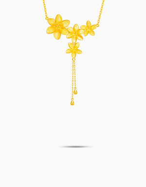 LVC necklace in 999 gold  designed with a row of dainty golden lily 