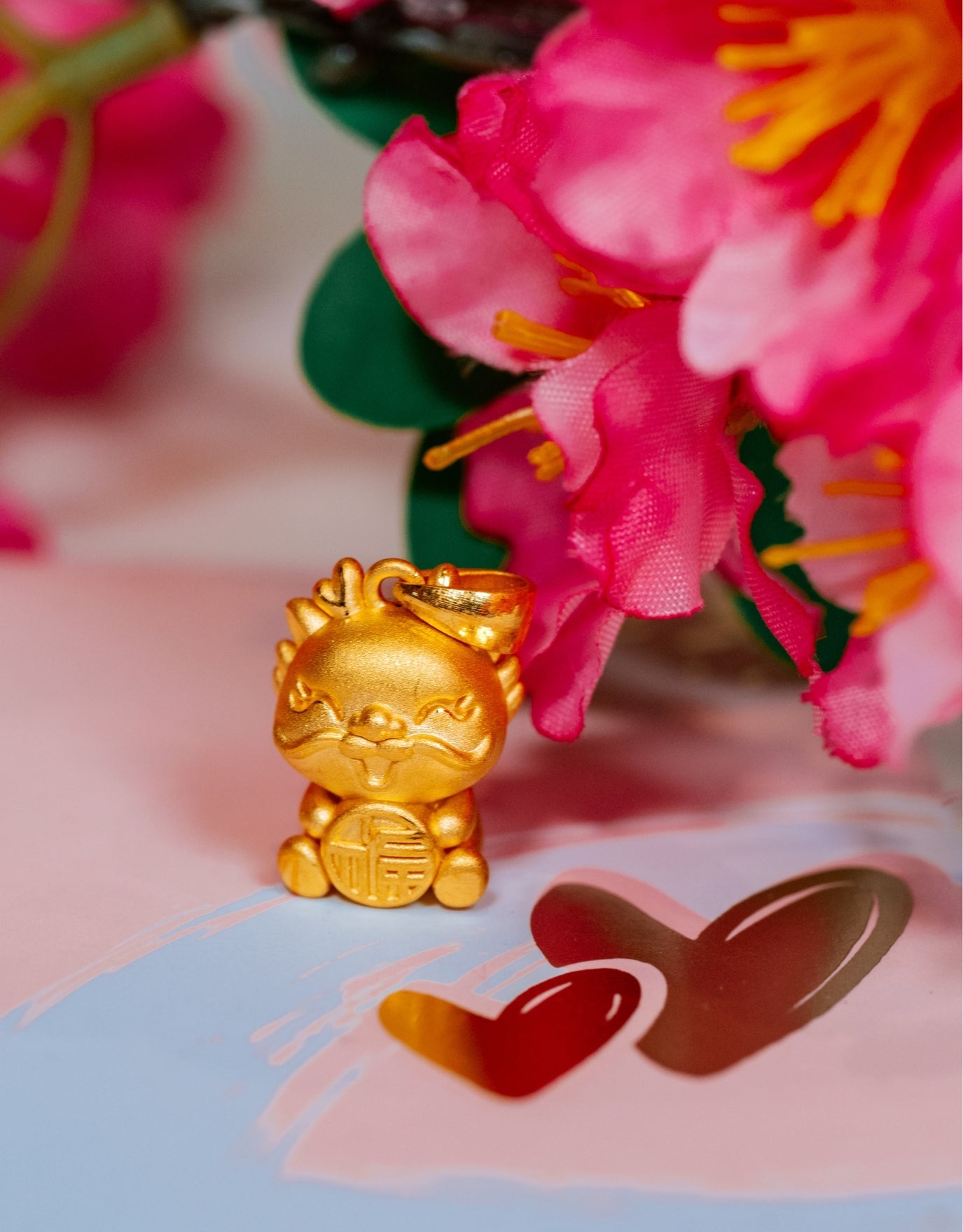 LVC necklace 999 Gold Pendant features a cheerful dragon designed with hearts close up