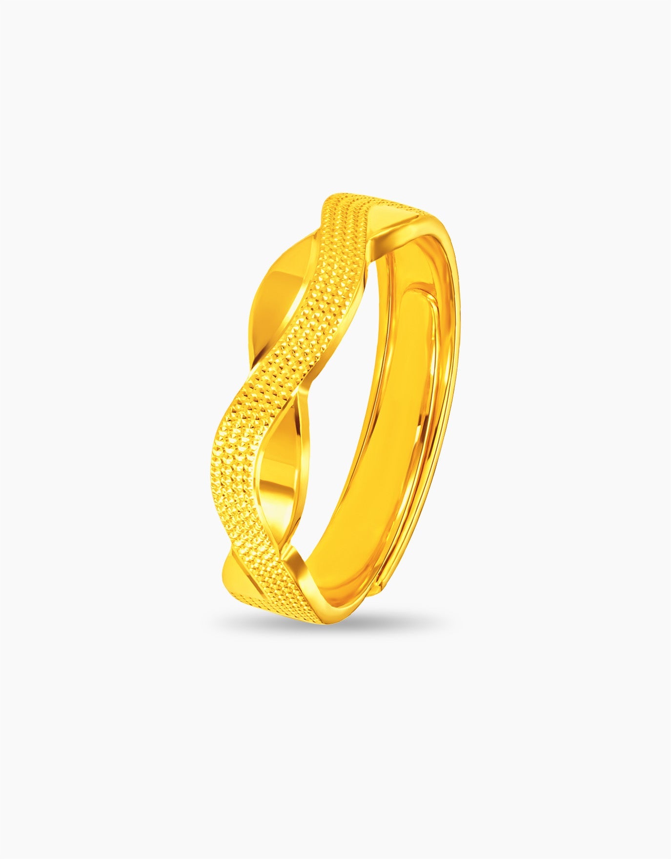 LVC wedding ring in 24 karat with wave like band with two textures